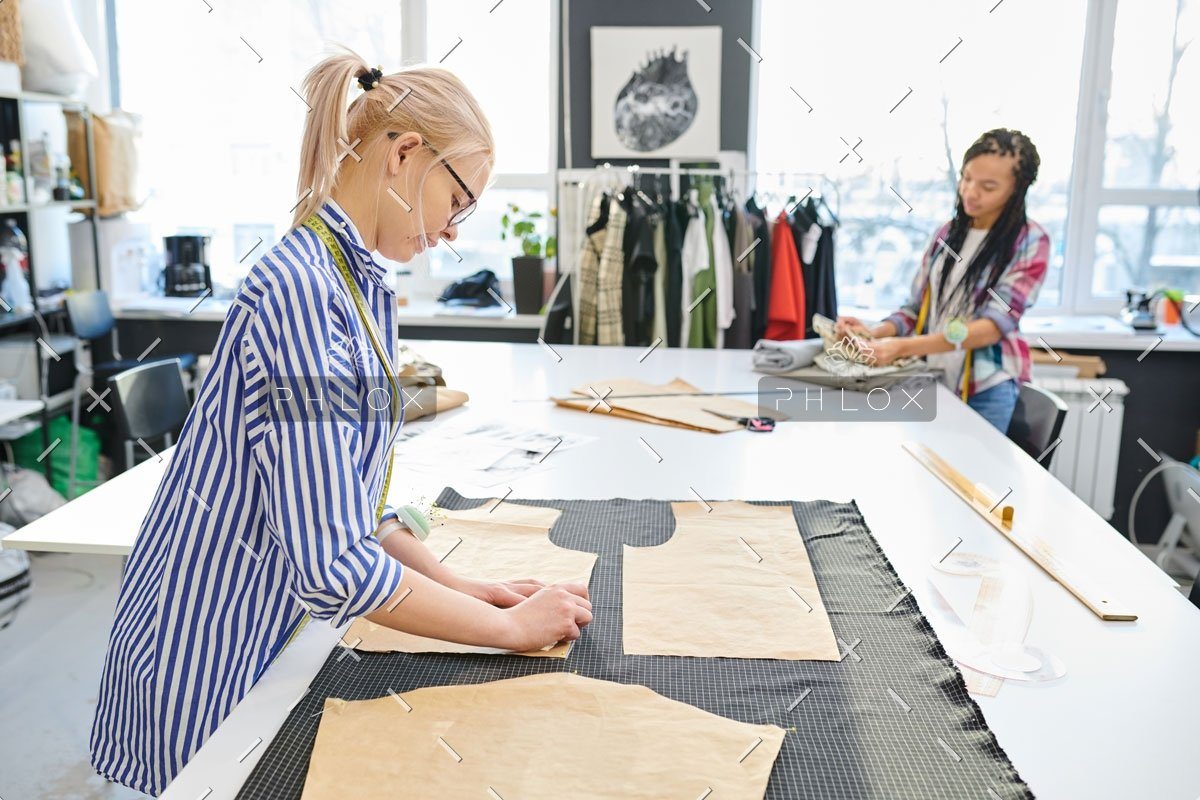 demo-attachment-452-dressmakers-working-in-atelier-8FJWN2X