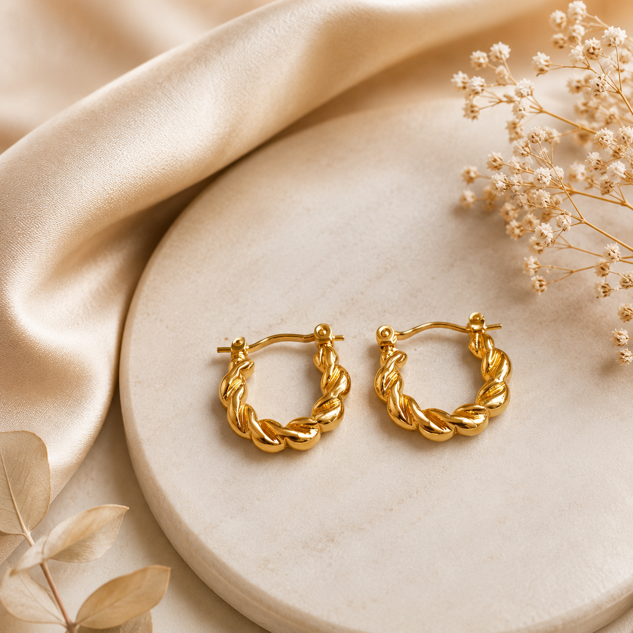 Twisted Croissant Golden Hoop Earrings
